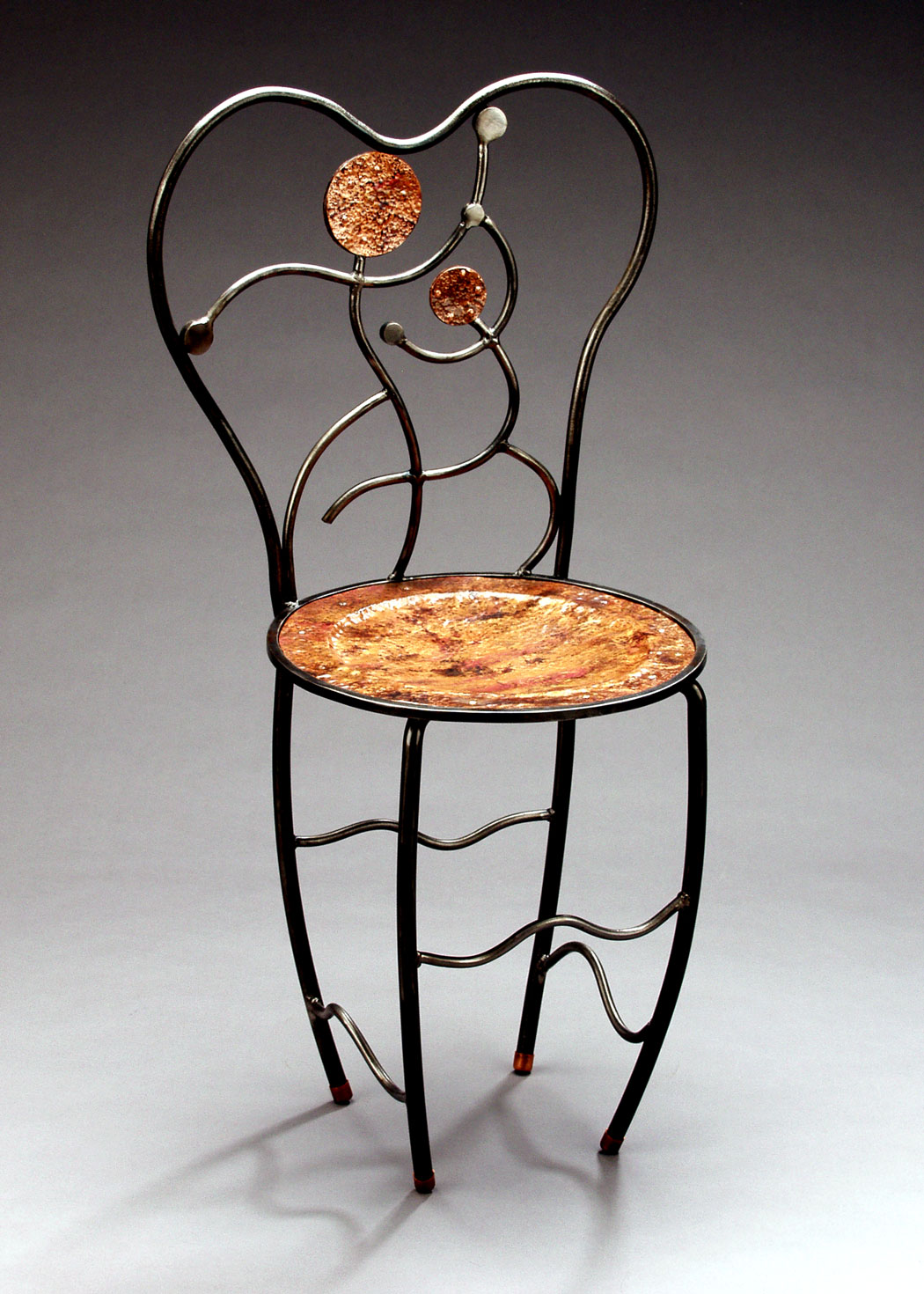 Acrobat Chair in steel and copper, Play