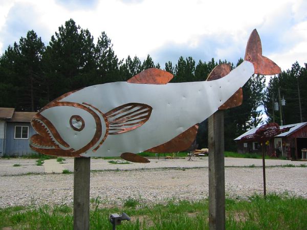 aluminum and copper giant fish sign