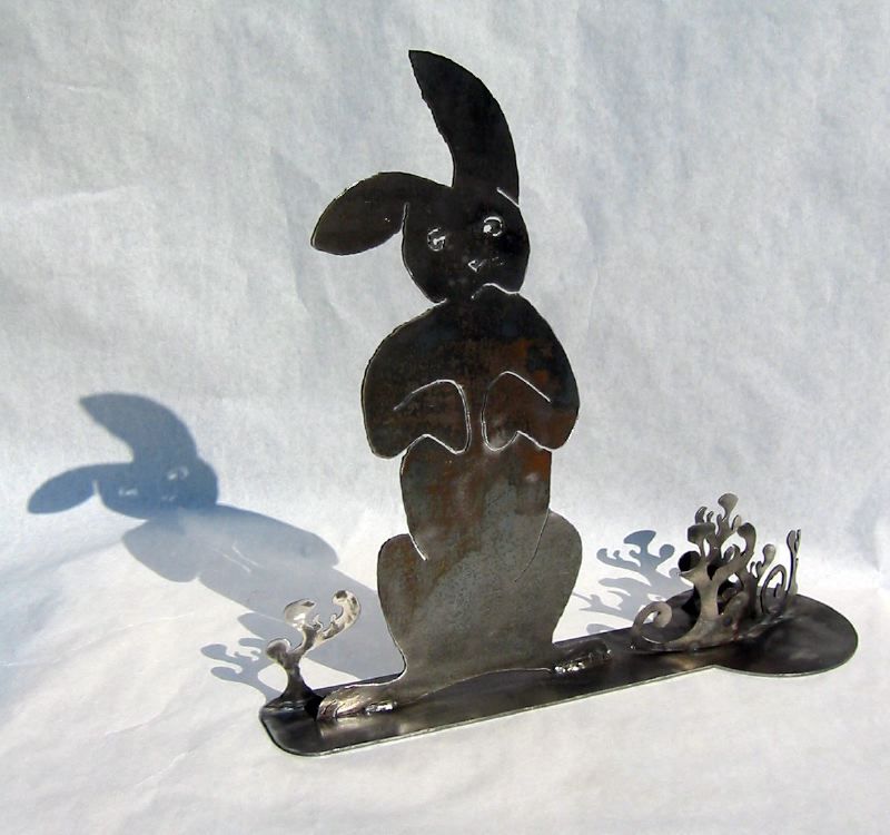 Sad Bunny Sculpture and evil shadow