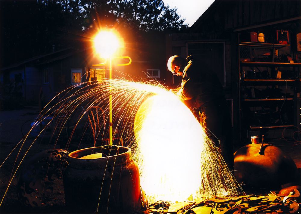 John T. Unger Cutting Firebowls in the studio