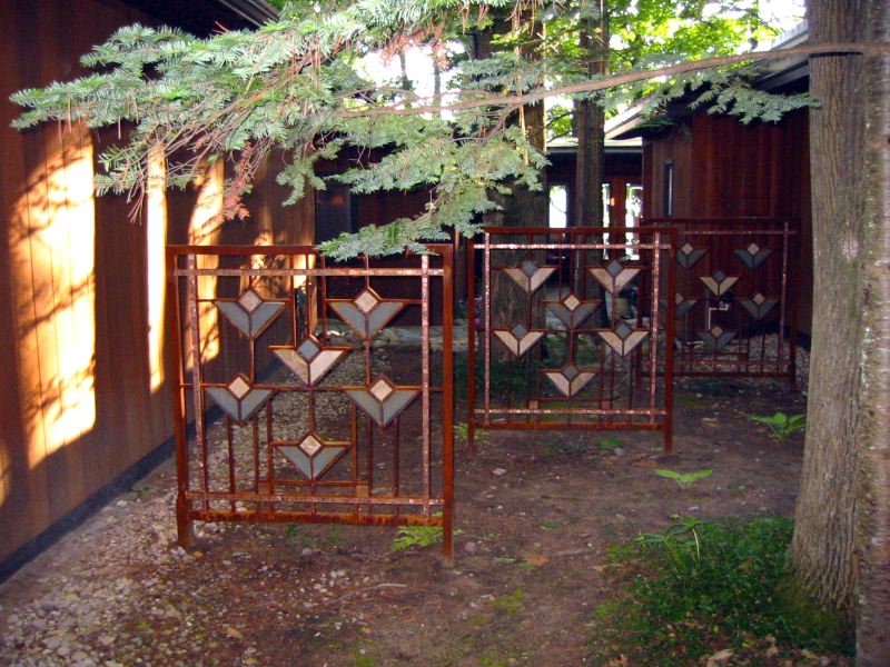 Frank Lloyd Wright Styled Fence in Steel, Slate, Copper + Glass