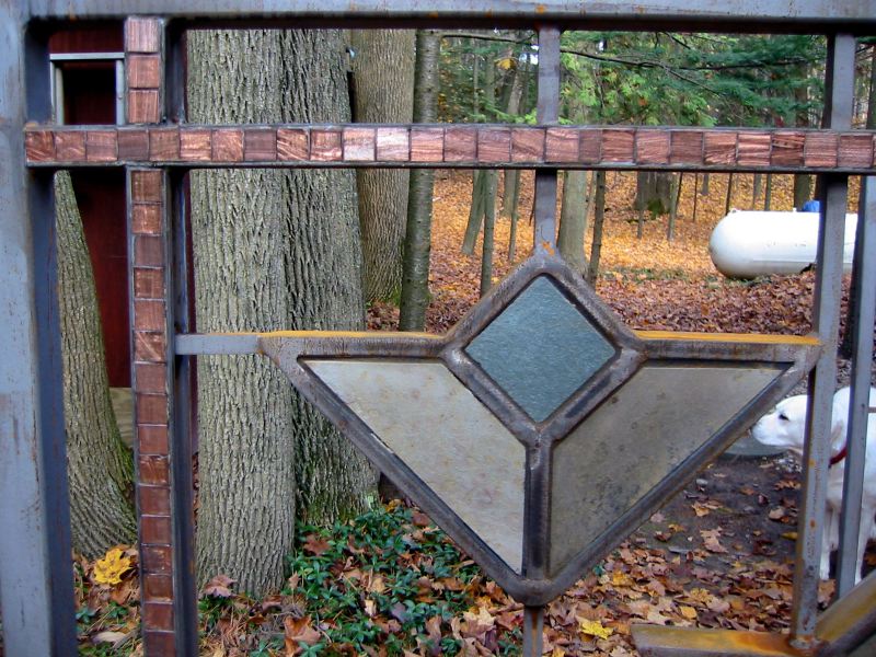 Frank Lloyd Wright Styled Fence in Steel, Slate, Copper + Glass