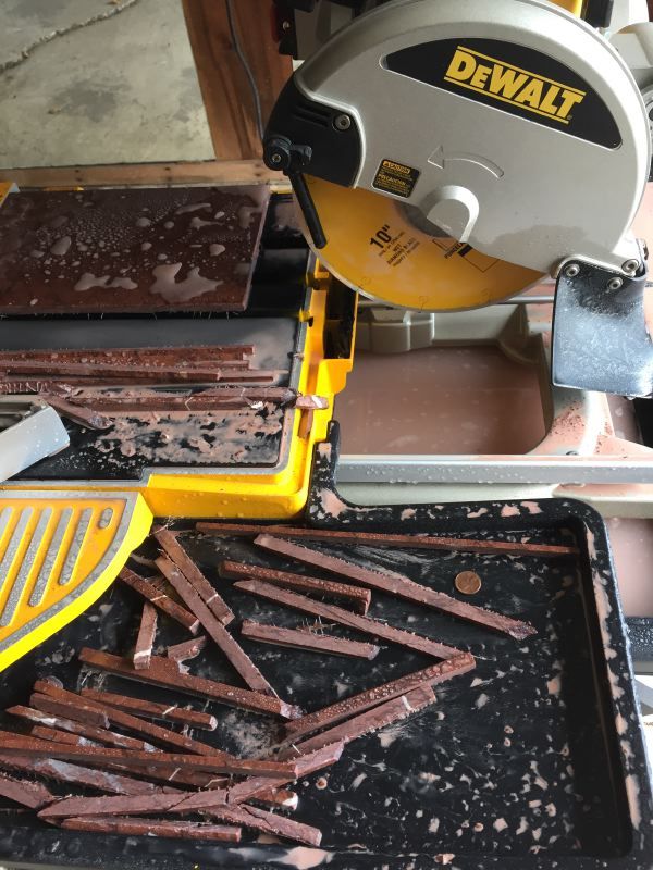 Cutting thin strips of stone on a DEWALT D24000S Heavy-Duty 10-inch Wet Tile Saw