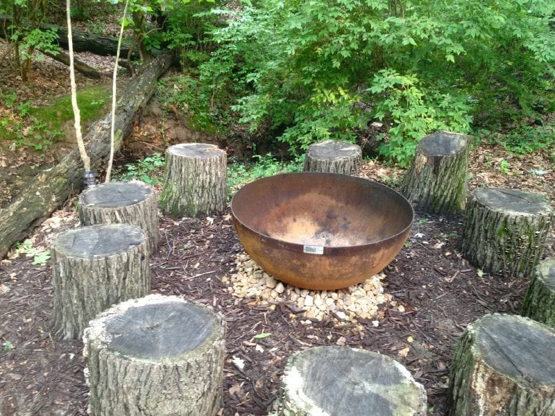 Zen Sculptural Fire Pit In A Rustic Setting In Olivette, MO