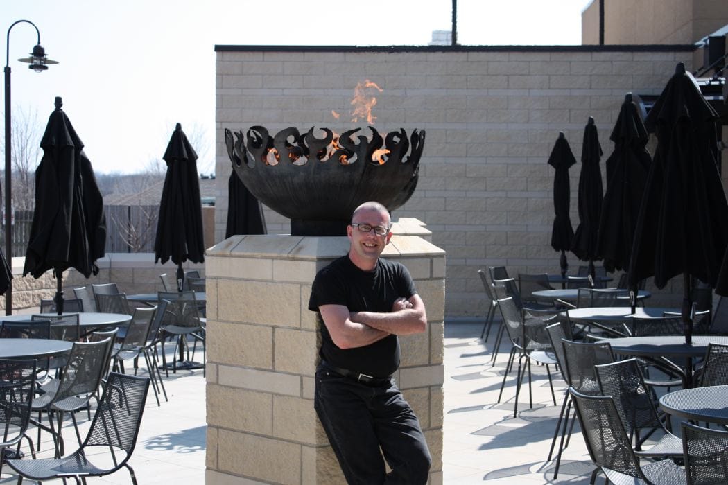 Fire Sculptural Fire Pit with artist at Brick Oven Courtyard Grille Topeka, KS