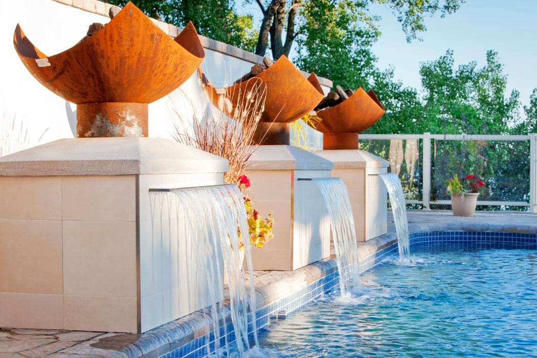 King Isosceles Sculptural Fire Pits with Pool and Fountain in Montreal