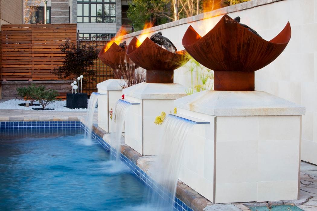 King Isosceles Sculptural Fire Pits with Pool and Fountain in Montreal