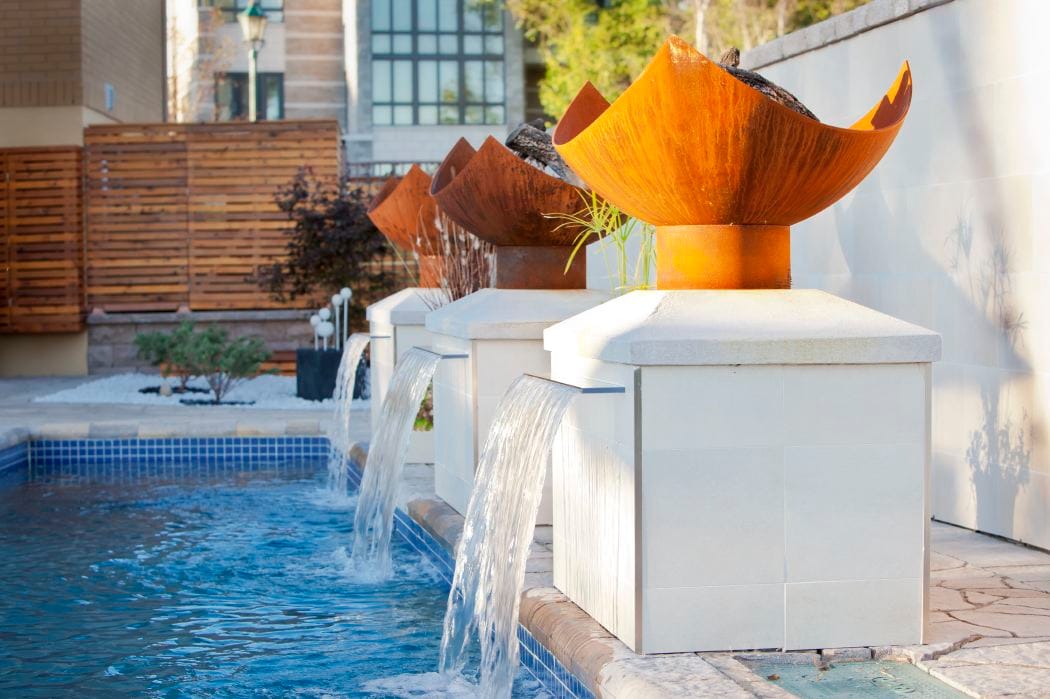 King Isosceles Sculptural Fire Pits with Pool and Fountain in Montreal