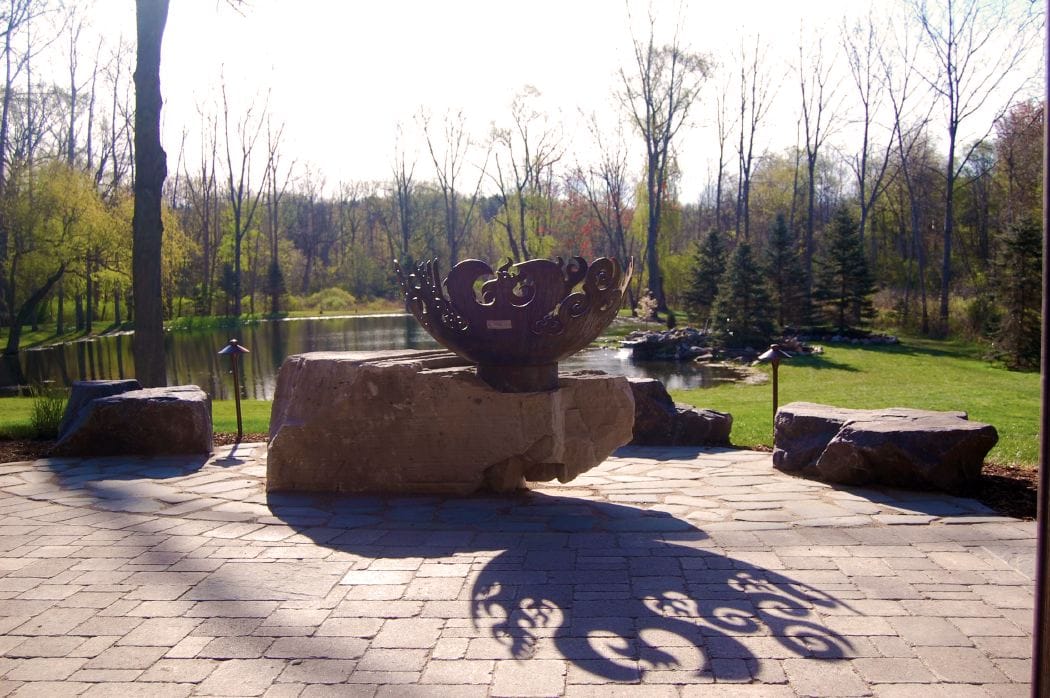 Fire Sculptural Fire Pit on giant stone