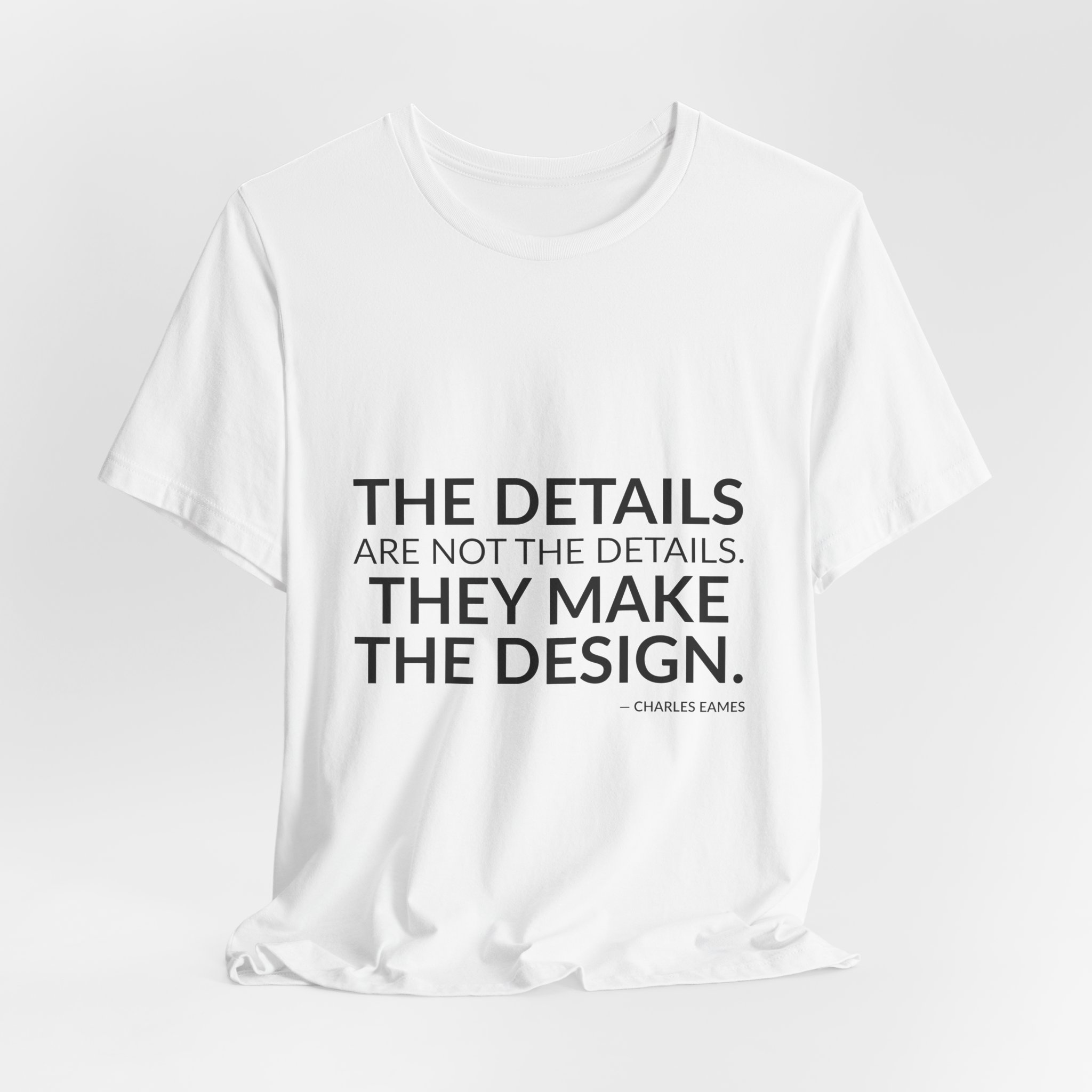 'They Make the Design' — Charles Eames Quote Tee | RQuéV Black-on-White Literary Tee — Classic Tee - Image 8