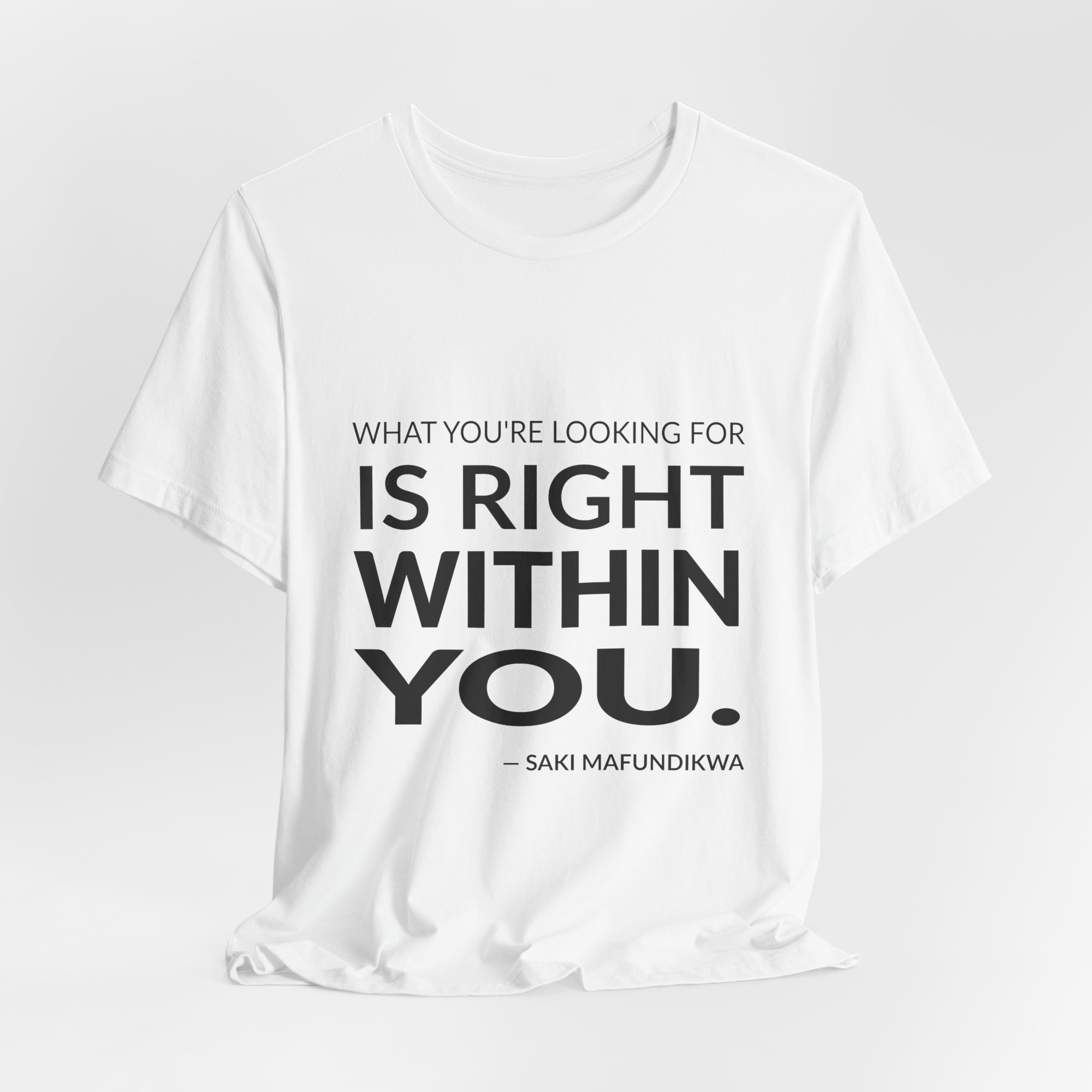 'What You're Looking for is' — Saki Mafundikwa Quote Tee | RQuéV Black-on-White Statement Shirt — Classic Tee - Image 7