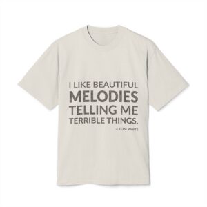 'I Like Beautiful Melodies Telling' — Tom Waits Quote Tee | Wear Words Typographic Statement Tee — Oversized Tee