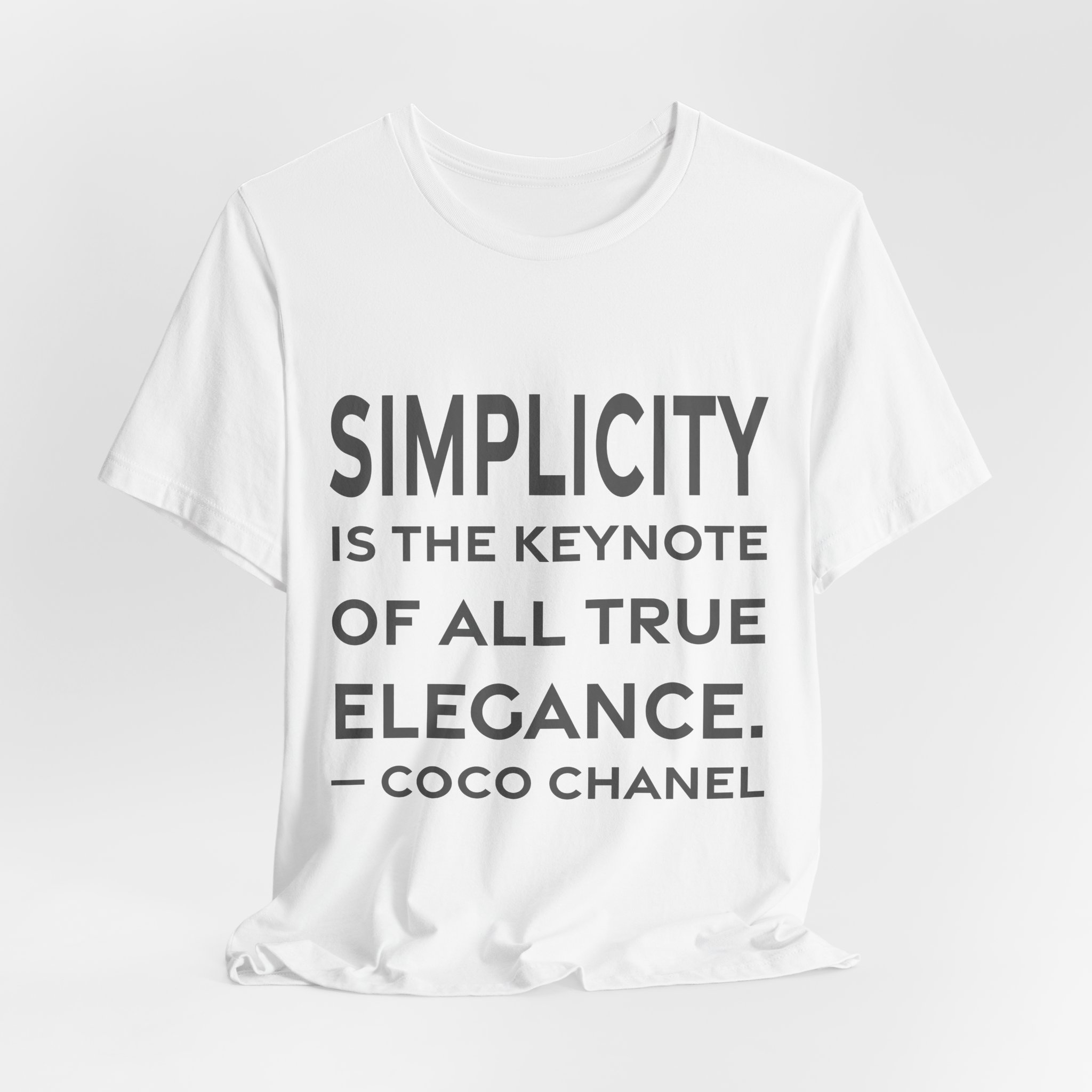 'Simplicity is the Keynote of' — Coco Chanel Quote Tee | RQuéV Black-on-White Literary Tee — Classic Tee - Image 2