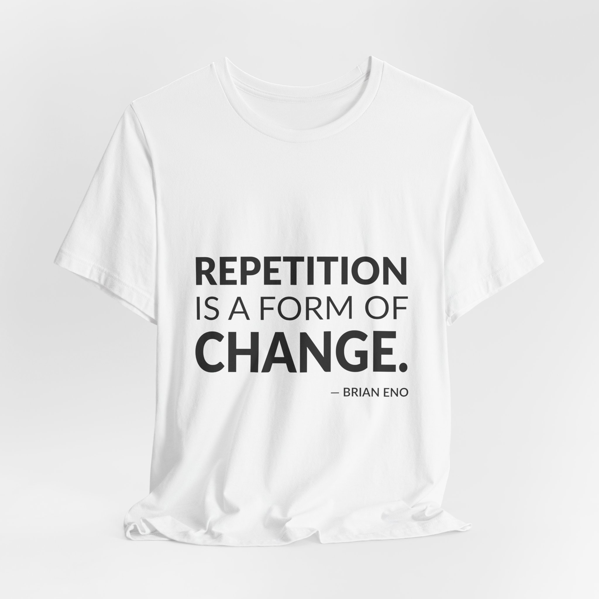 'Repetition is a Form of Change' — Brian Eno Quote Tee | RQuéV Typographic Statement Tee — Classic Tee - Image 4