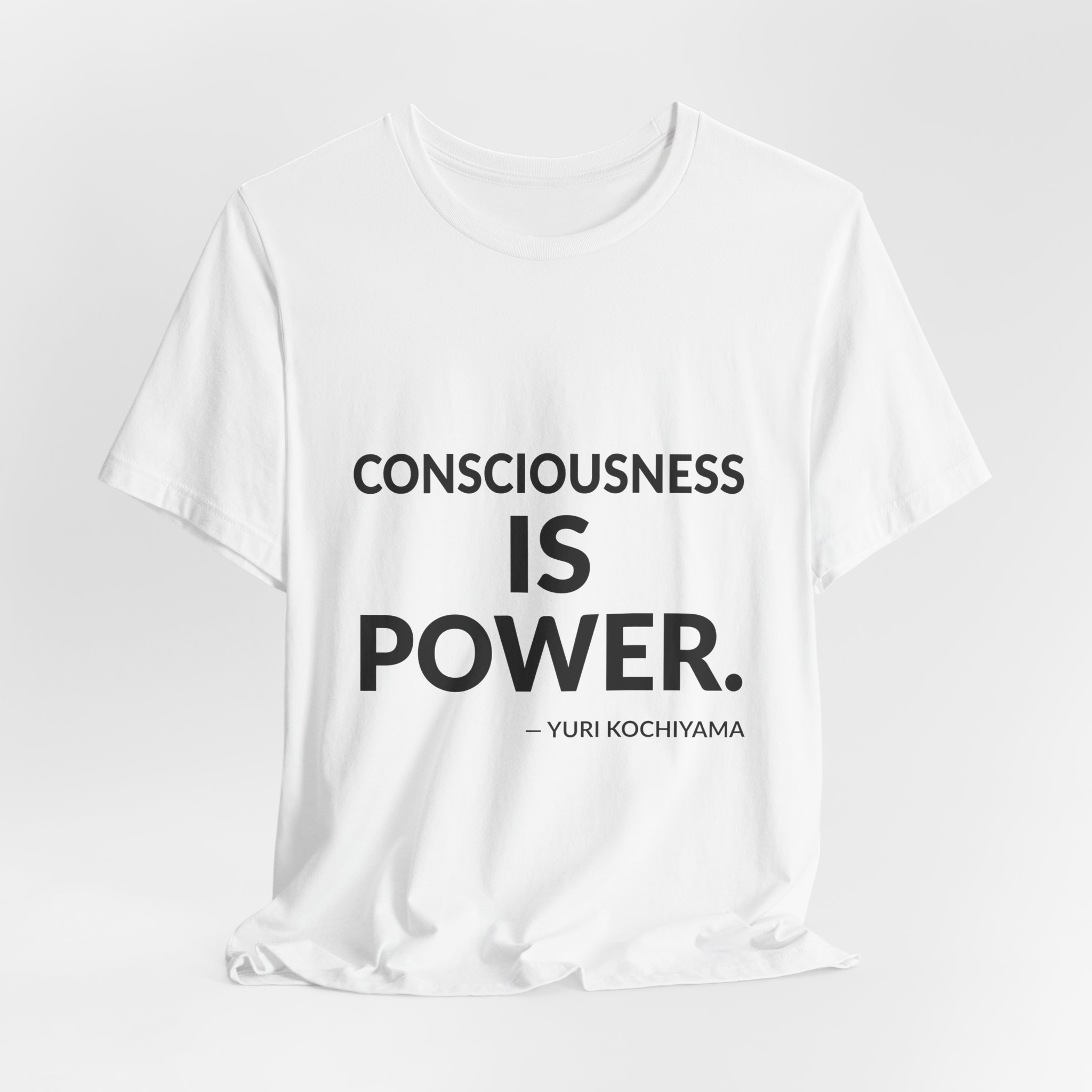 'Consciousness is Power' — Yuri Kochiyama Quote Tee | RQuéV Black-on-White Statement Shirt — Classic Tee - Image 6