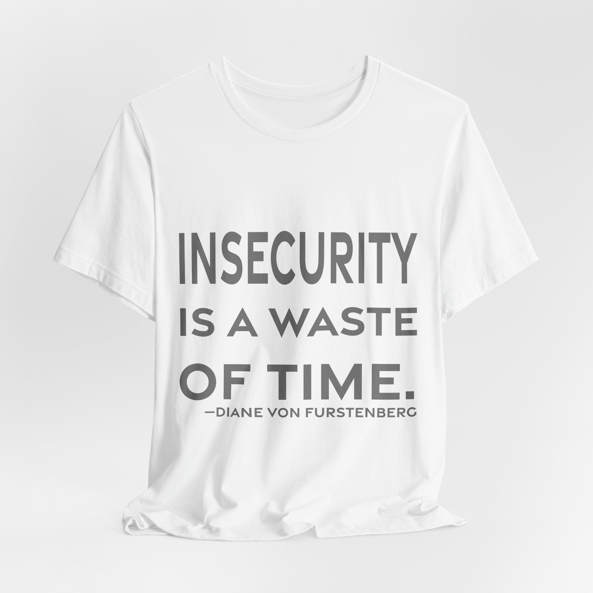 'Insecurity is a Waste of Time' — Diane von Fürstenberg Quote Tee | RQuéV Black-on-White Literary Tee — Classic Tee - Image 8