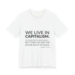 'We Live in Capitalism' — Ursula K. Le Guin Quote Tee | RQuéV Typographic Statement Tee — Classic Tee