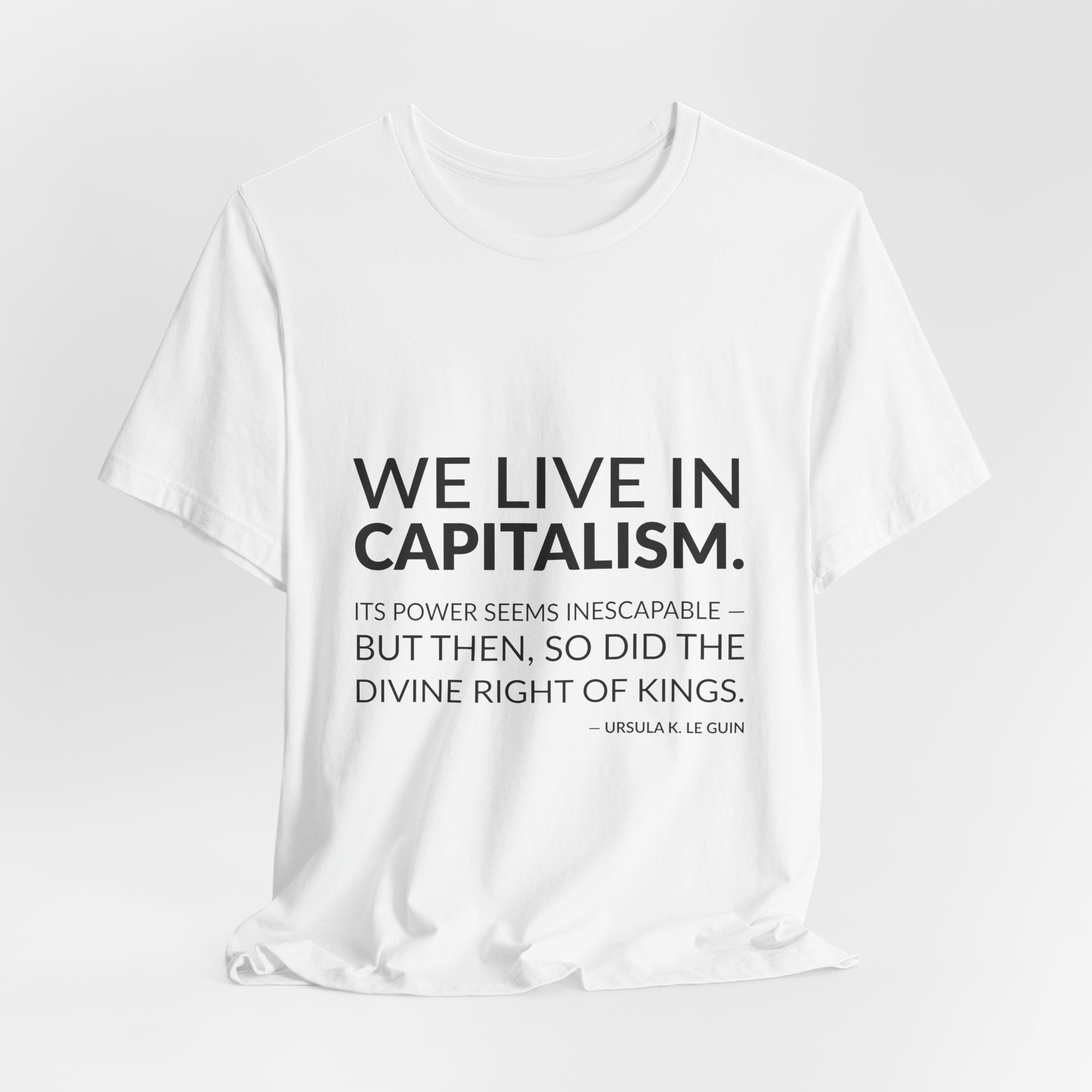 'We Live in Capitalism' — Ursula K. Le Guin Quote Tee | RQuéV Typographic Statement Tee — Classic Tee - Image 3